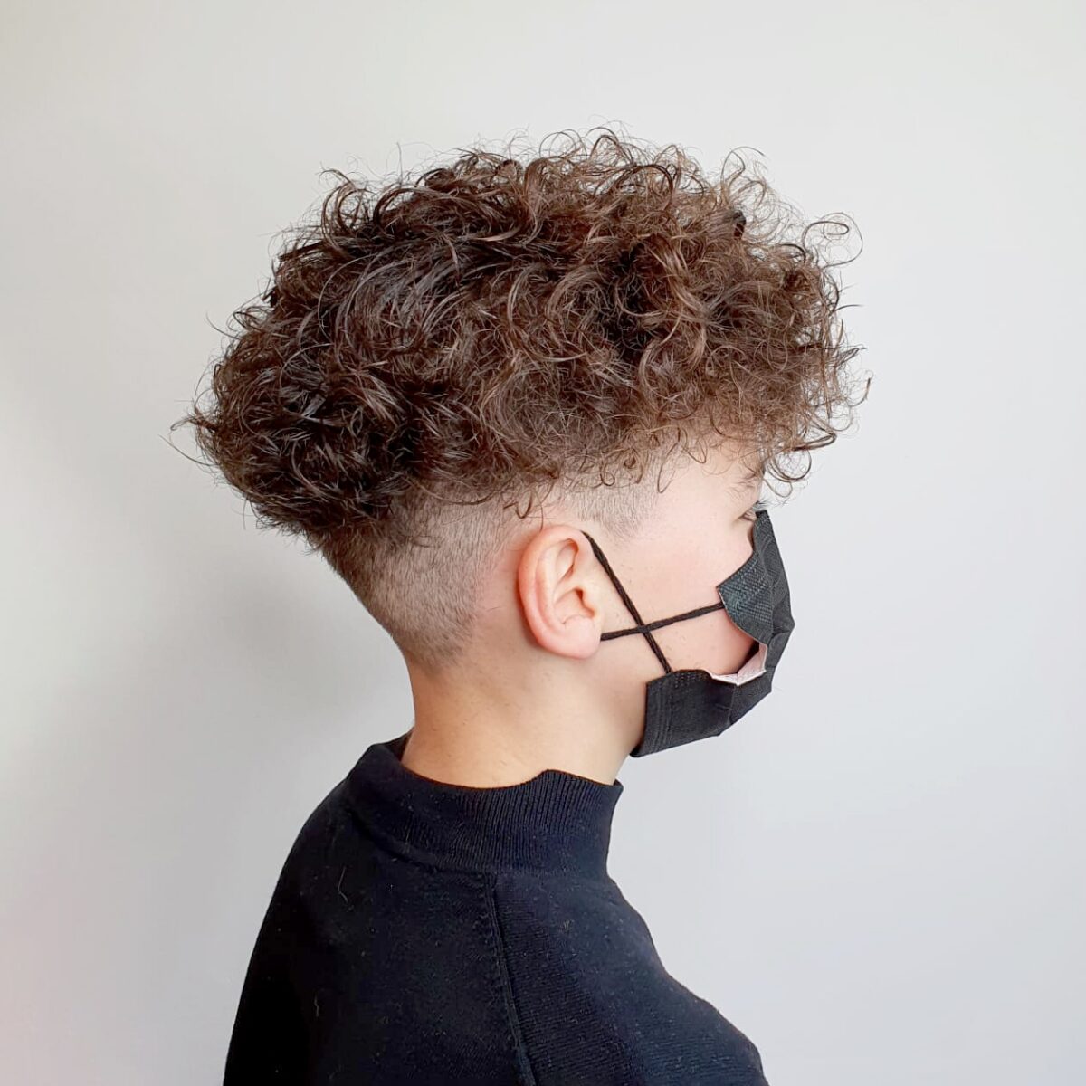 Natuurlijke krullen en fade